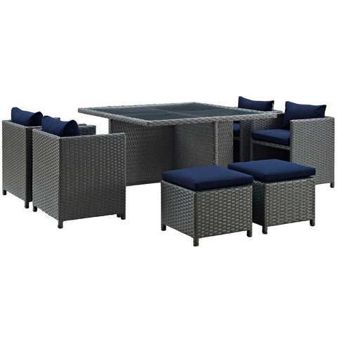 Oakestry Sojourn 9 Piece Outdoor Patio Dining Set with Navy Cushions and Wicker Seating